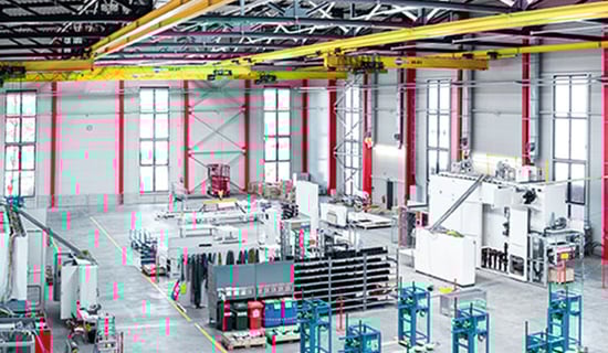 Interior of a large warehouse with shelves and storage racks