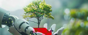 Roboterhand hält eine rote Fläche, auf der ein junger Baum wächst – Symbol für Nachhaltigkeit und Technologie