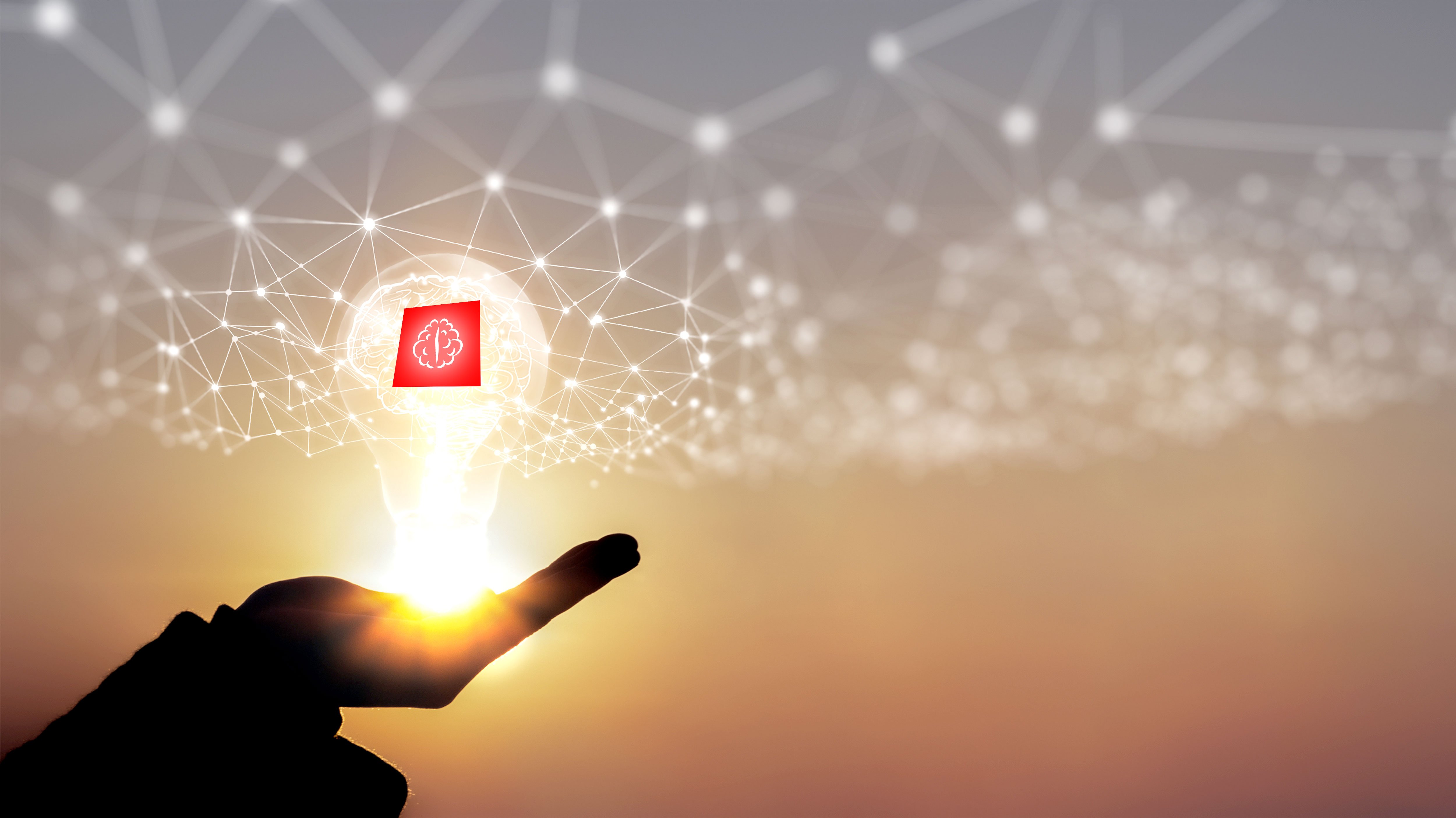 Symbolische Darstellung für digitale Zusammenarbeit: rotes DATAGROUP‑Logo schwebt über einer Hand, umgeben von einem digitalen Netzwerk.
